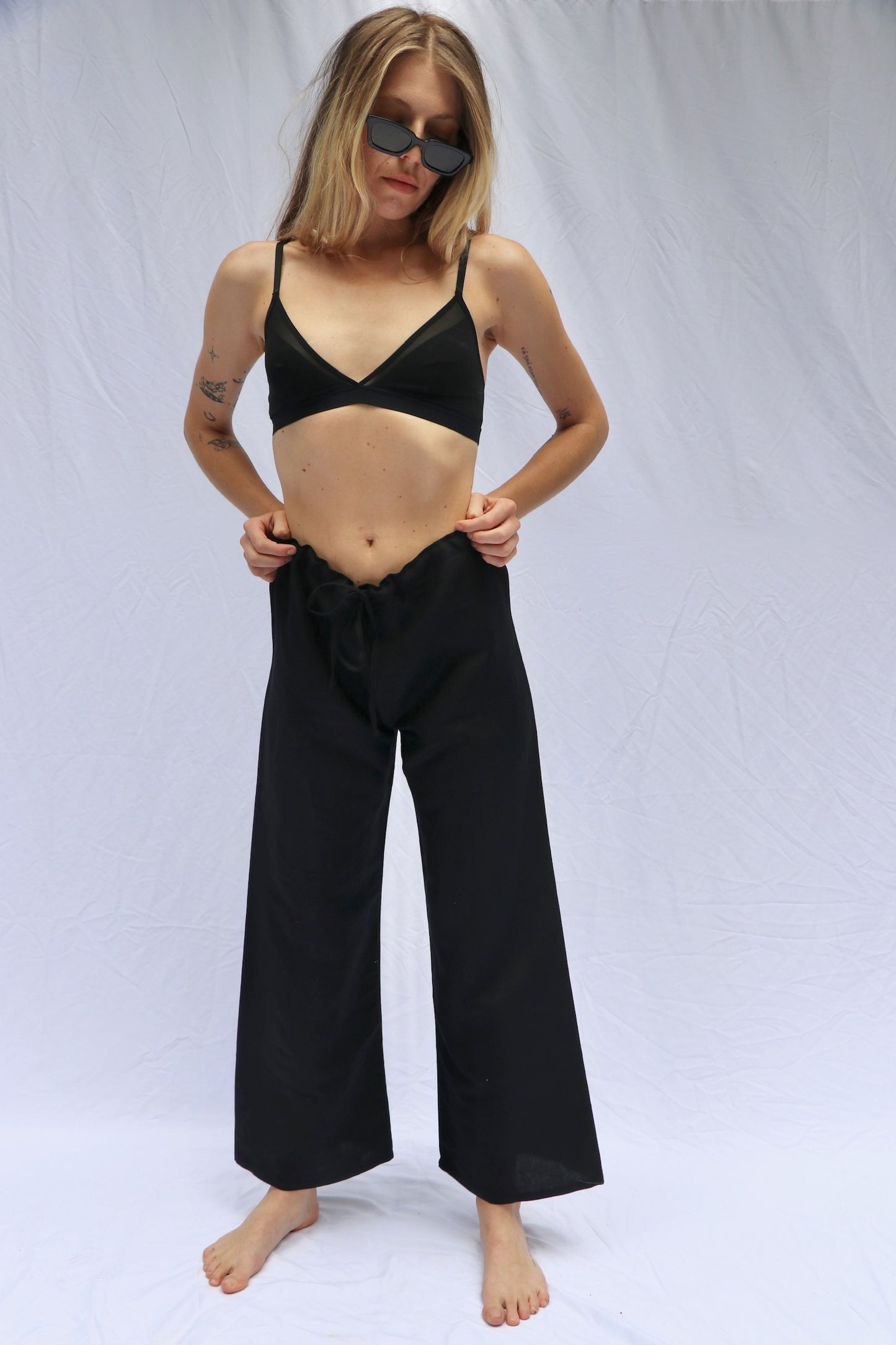 Margaux Pant by Barrett - Buttery soft linen pants. Versatile high or low rise fit for ultimate comfort. Relaxed leg with adjustable drawstring waistband Designed, Cut and Sewn in LA Made from dead stock fabric.